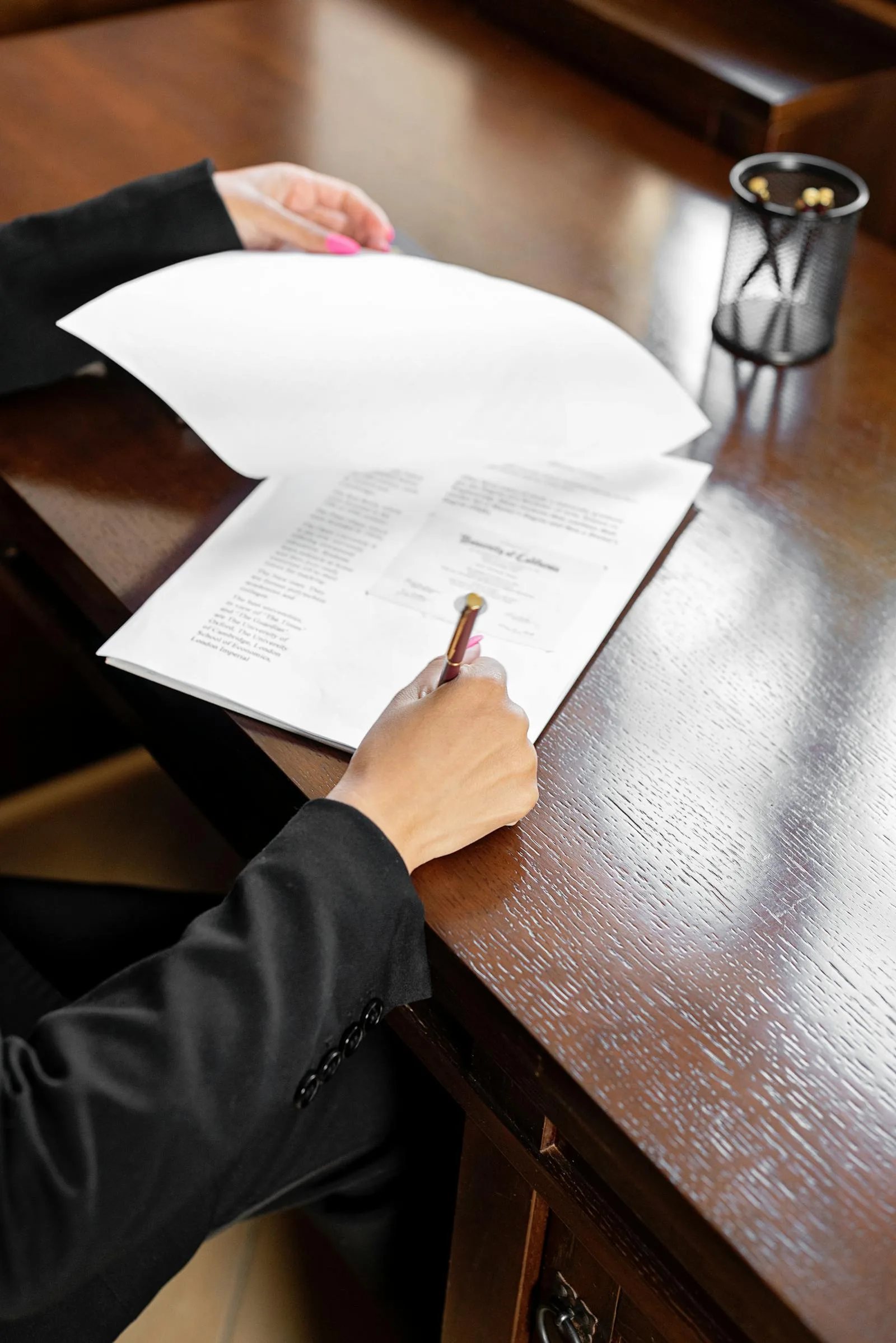 A last will and testament document on a desk.