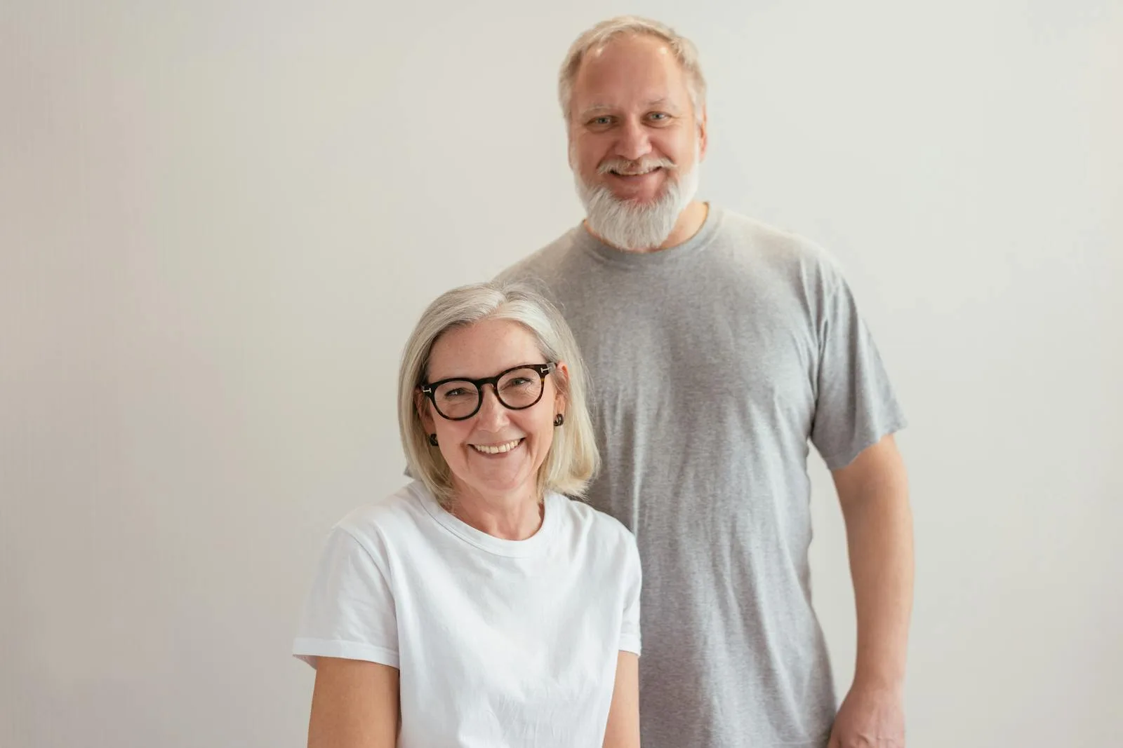 Happy elderly couple smiling together.